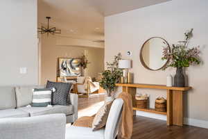 Living room featuring wood finished floors and baseboards