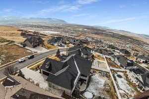 Aerial view of residential area with a mountain backdrop