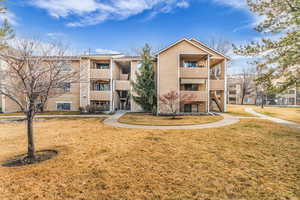 View of apartment building / complex featuring stairway