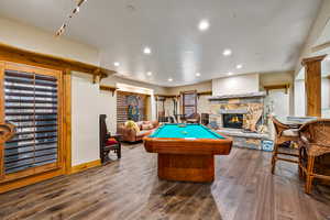 Playroom with a fireplace, billiards, dark wood-type flooring, and recessed lighting