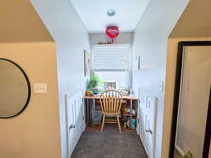 Office with dark carpet