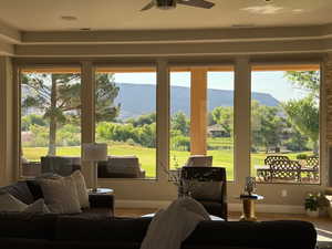 Sunroom / solarium with golf course view