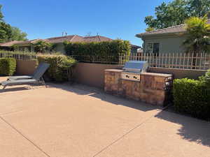 View of patio featuring an outdoor kitchen