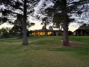 Yard at dusk with a yard