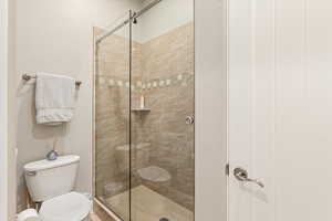 Bathroom featuring a stall shower