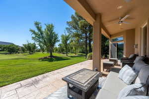 View of patio / terrace featuring an outdoor lounge area and a ceiling fan