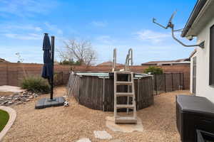 Fenced backyard featuring a patio area