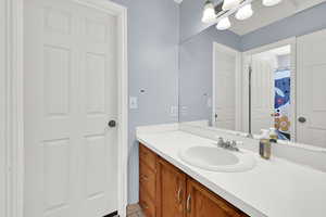 Bathroom with vanity and a shower with curtain