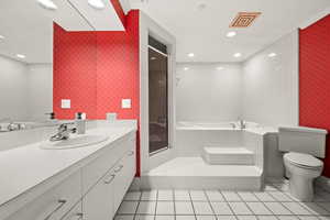 Full bath featuring wallpapered walls, a stall shower, a bath, vanity, and light tile patterned flooring