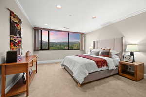 Bedroom featuring ornamental molding, light carpet, and recessed lighting