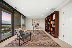 Home office featuring crown molding, recessed lighting, and light colored carpet