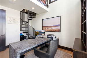 Office area featuring light wood-style flooring