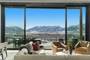 Living area with a mountain view and plenty of natural light