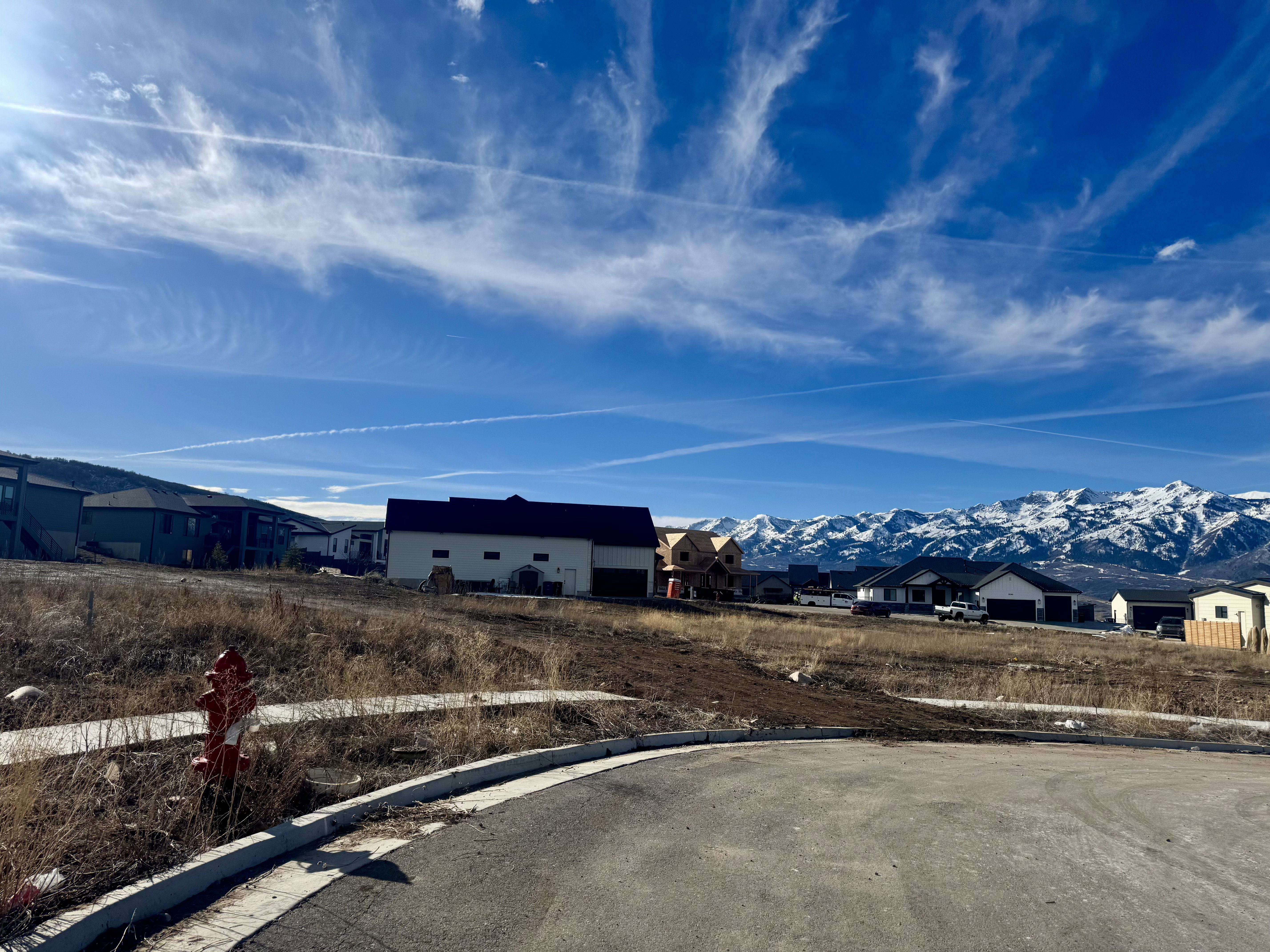 View of yard featuring a mountain view and a residential view