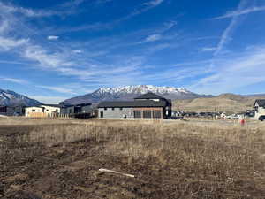 Rear view of property featuring a mountain view