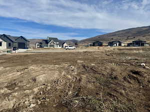 View of yard with a mountain view