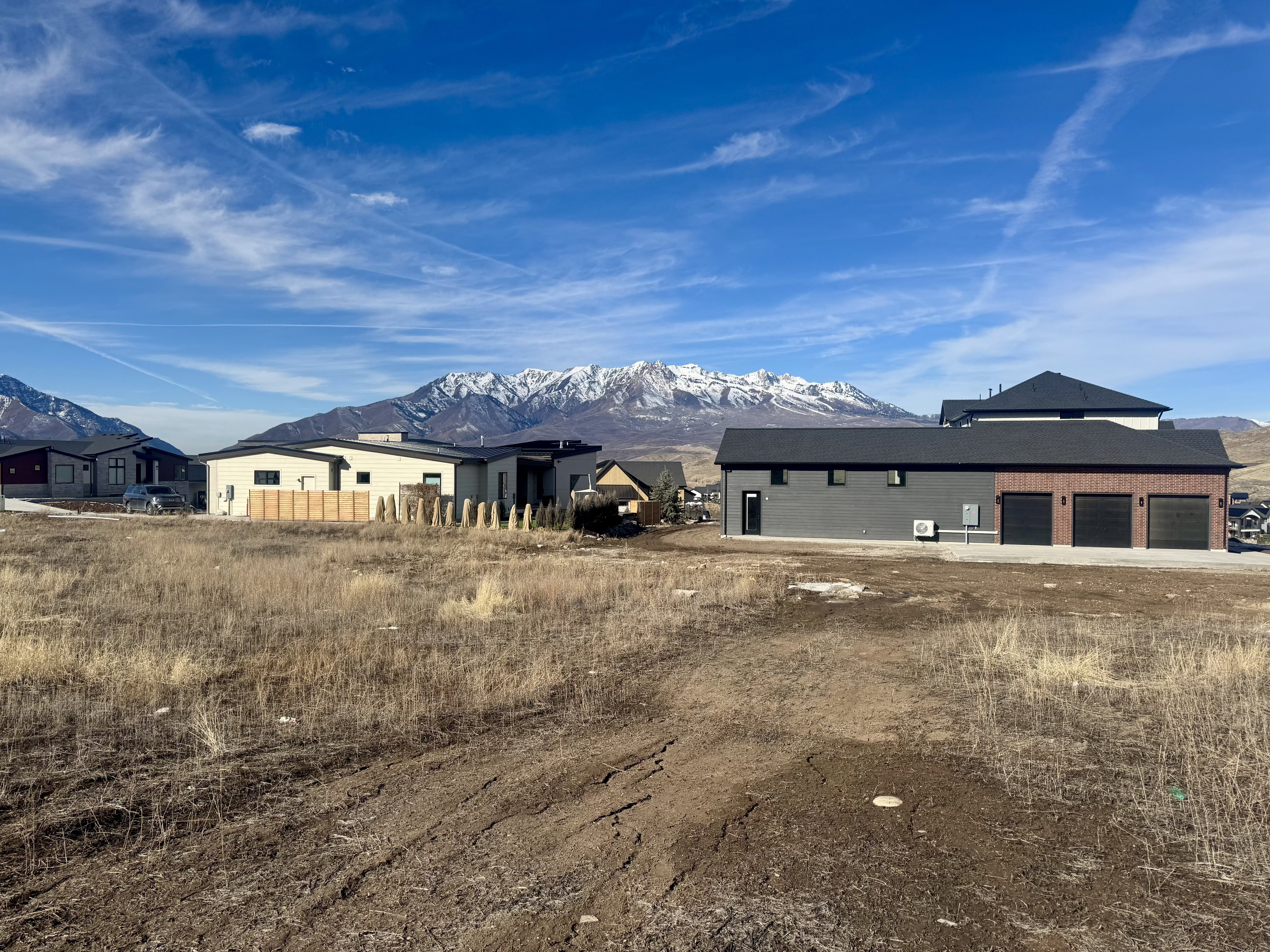 Rear view of house featuring a mountain view