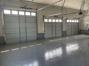 Garage featuring a garage door opener