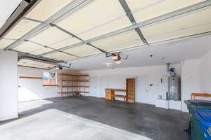 Garage featuring water heater