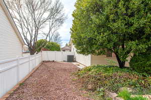 View of fenced backyard