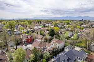 Aerial view of residential area featuring a mountain backdrop