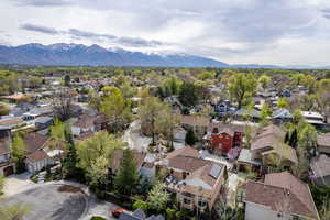 Aerial view of residential area featuring mountains