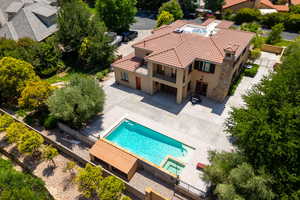 View from above of property featuring a pool