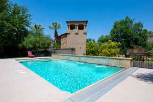 Integrated pool / hot tub with a patio area