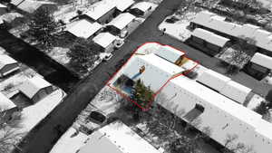 Aerial perspective of suburban area with property boundaries highlighted