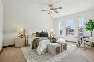 Bedroom featuring carpet floors and a ceiling fan
