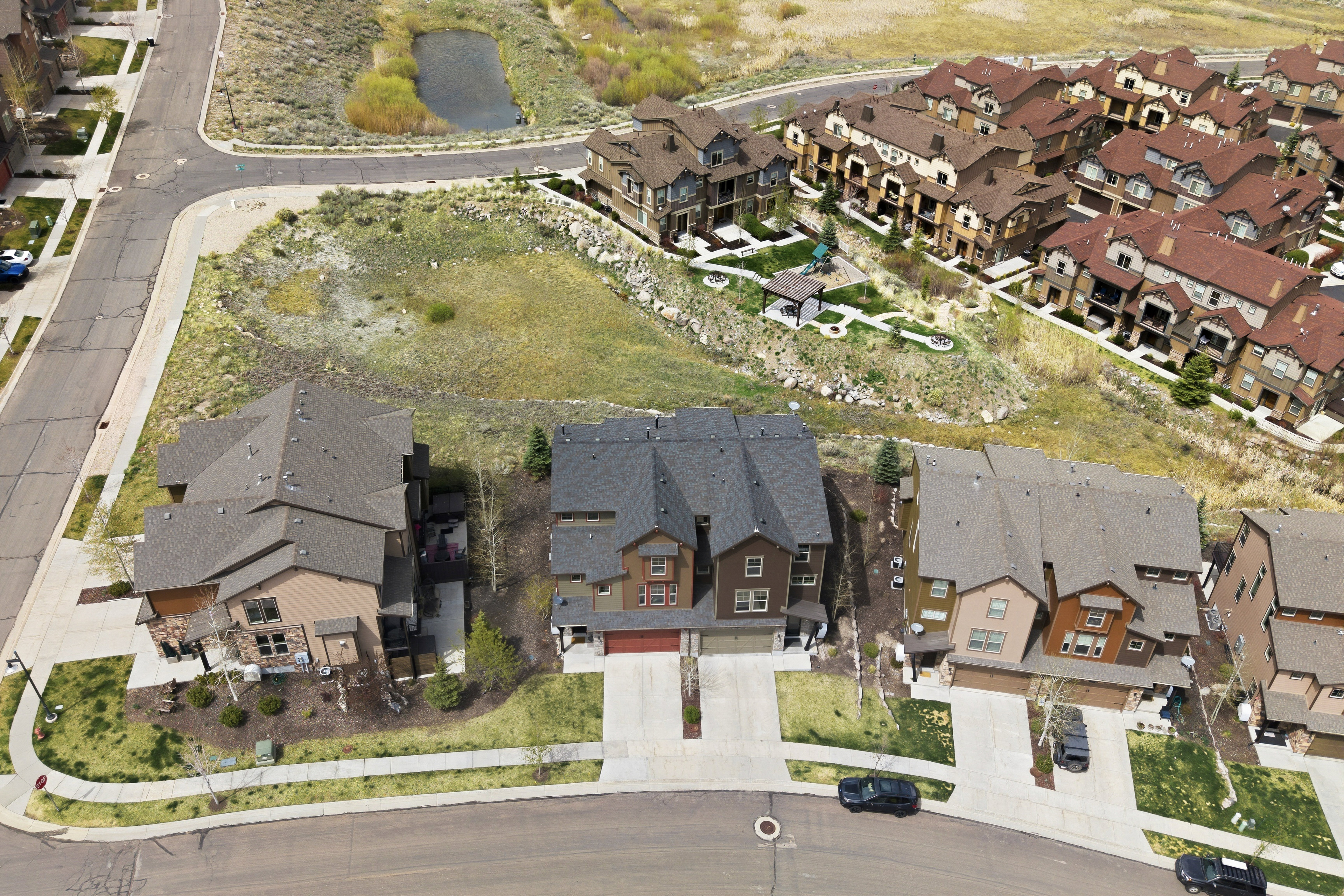 Townhome community featuring multi-level residences with attached garages