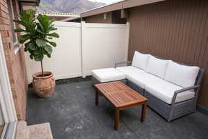 View of patio / terrace with a mountain view and an outdoor lounge area