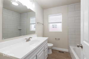 Bathroom featuring vanity and wood tiled floors