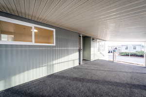 View of patio with an attached carport