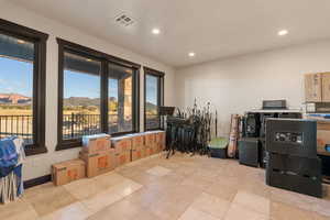 Miscellaneous room featuring a mountain view and recessed lighting