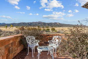 View of patio / terrace with a mountain view