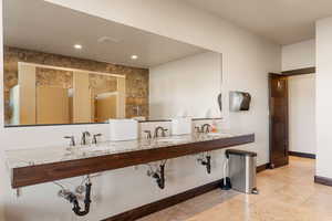 Full bath featuring recessed lighting and double vanity