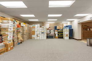 Misc room with a paneled ceiling