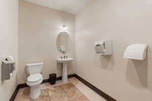 Bathroom with toilet and a sink