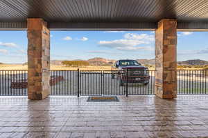 View of patio with a mountain view