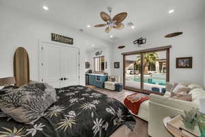 Bedroom with access to exterior, wood finished floors, recessed lighting, ceiling fan, and a closet