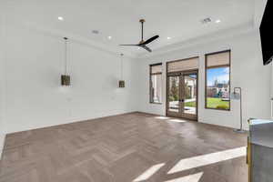 Spare room with french doors, ceiling fan, parquet flooring, and recessed lighting