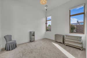 Unfurnished room featuring light carpet and recessed lighting