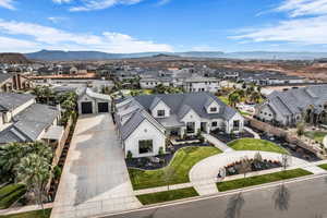 Aerial view of residential area featuring mountains