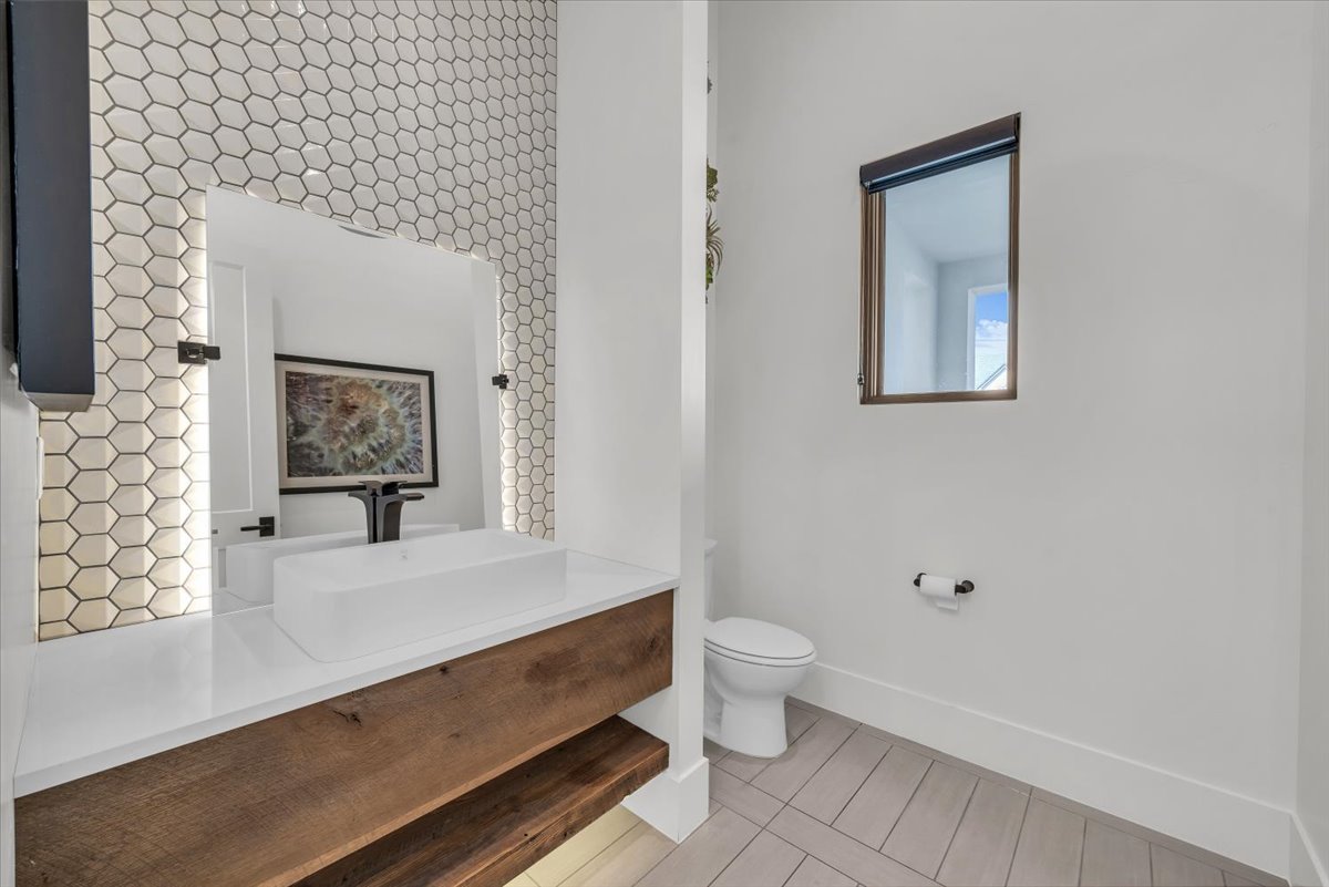 Bathroom with toilet and vanity
