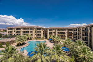 Community pool with a patio area
