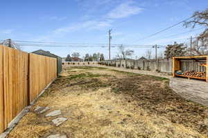 View of fenced backyard