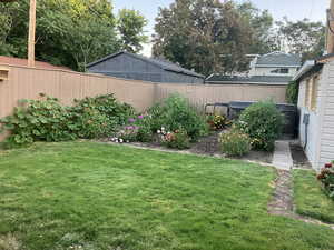 View of fenced backyard