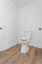 Bathroom featuring wood finished floors