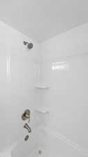 Full bathroom featuring shower / bath combination